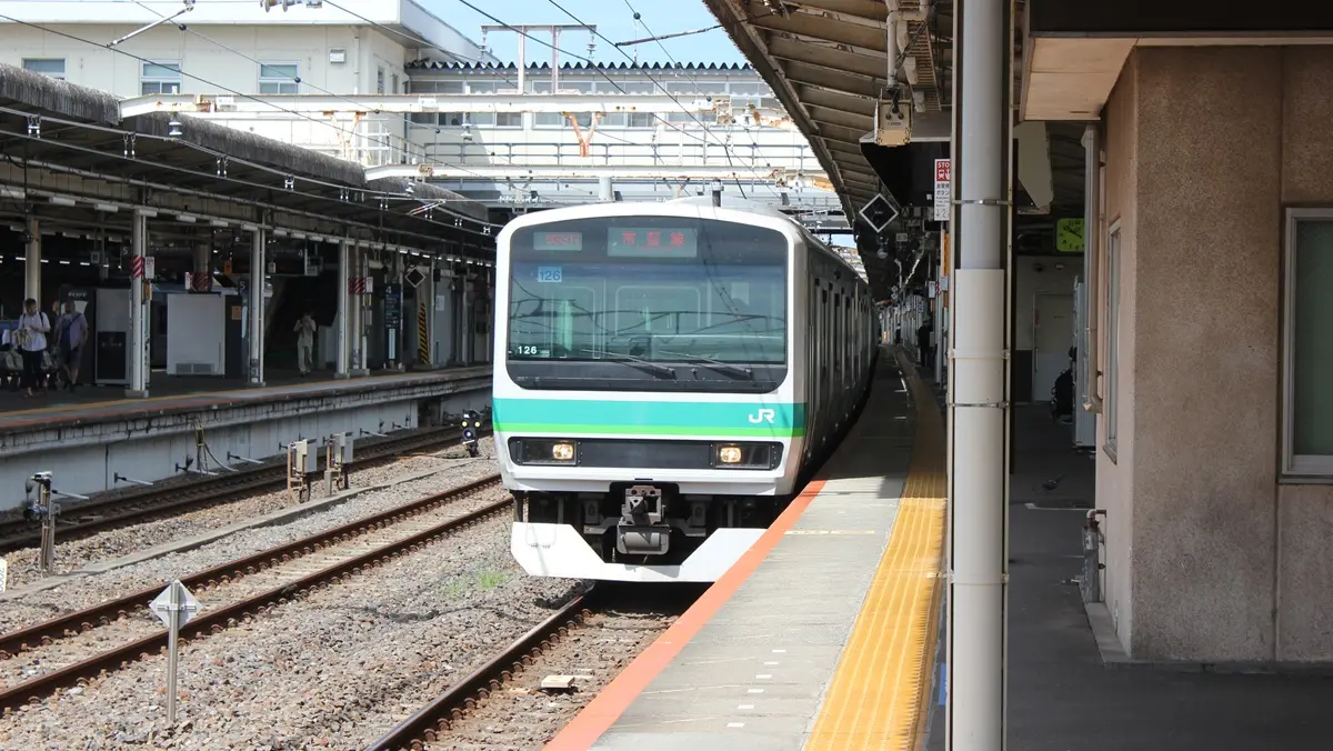Joban Line Rapid E231 series train arriving at Abiko Station