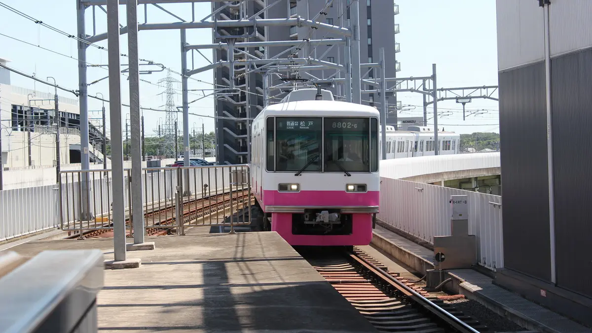 Keisei Matsudo Line 8800 series train arriving at Shin-Kamagaya Station