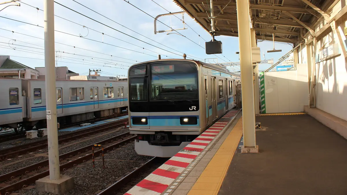 Tokyo Metro E231 series 800 train on the Tozai Line arriving at Baraki-Nakayama Station