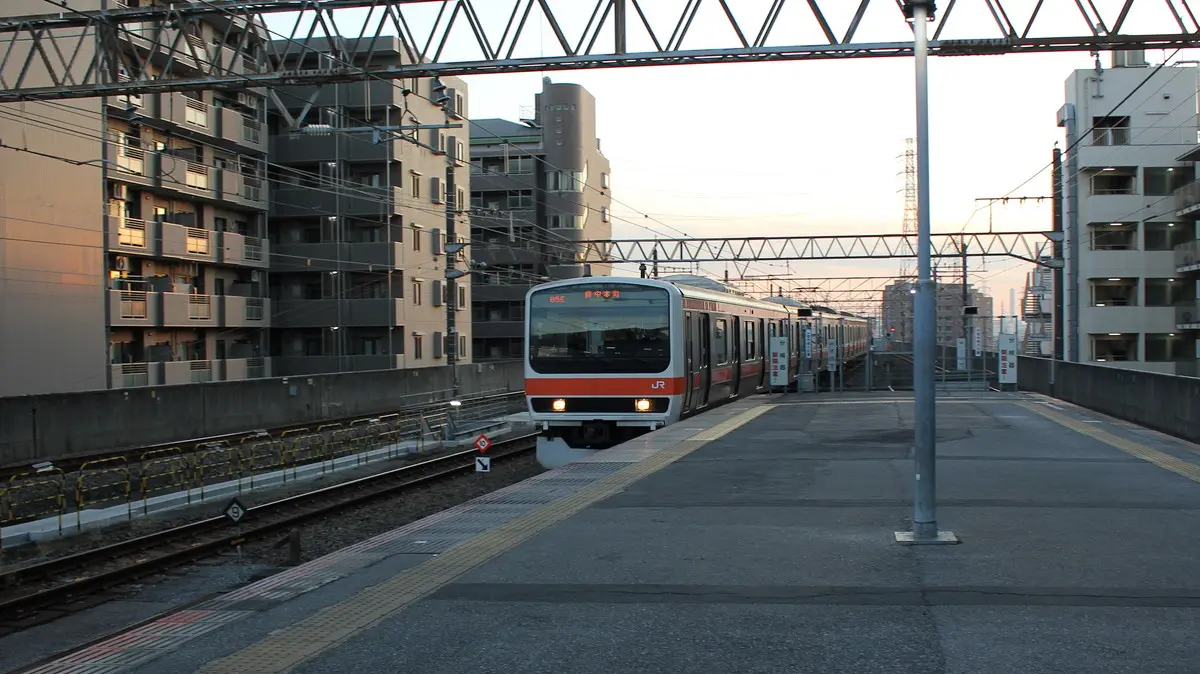Musashino Line E231 series train arriving at Nishi-Funabashi Station