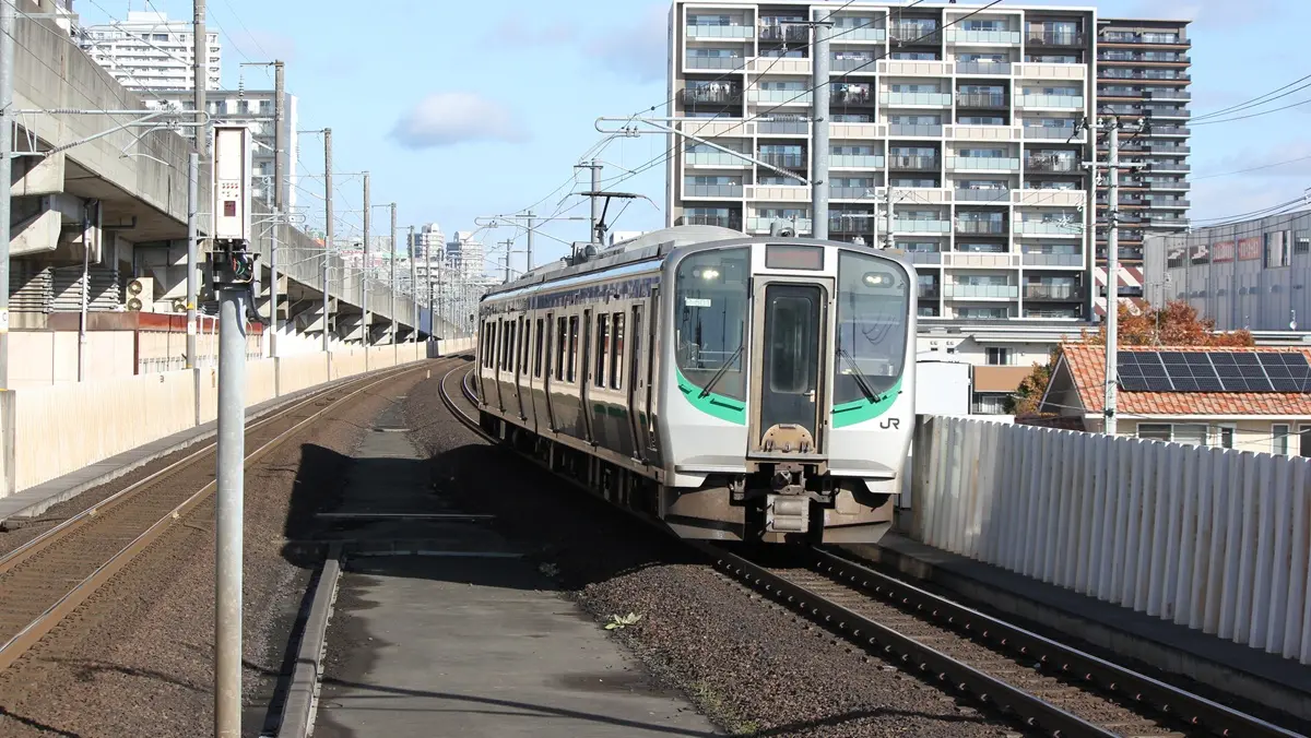 Sendai Airport Line E721 series train heading towards Taishido Station
