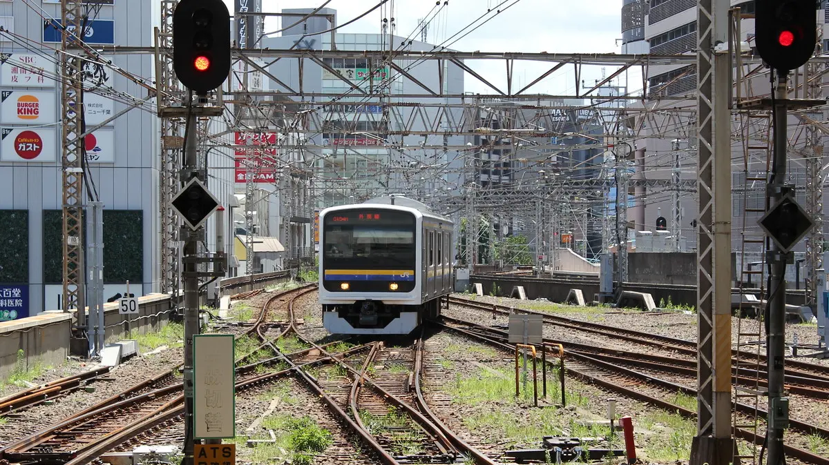Sotobo Line 209 series train arriving at Chiba Station