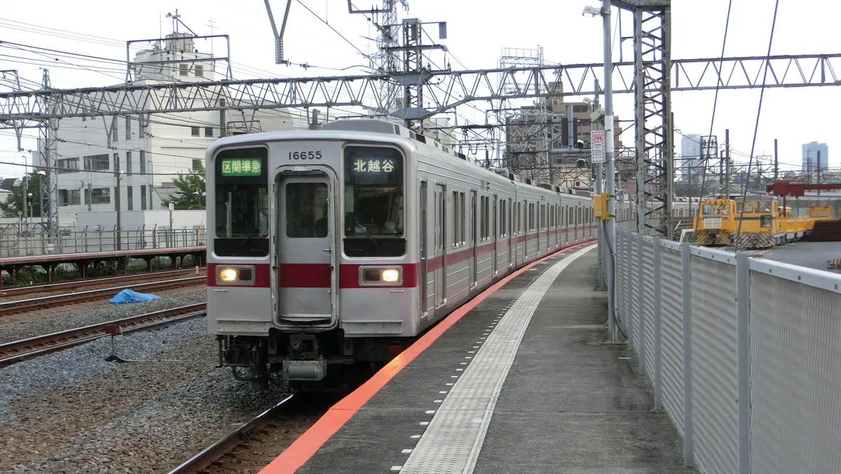 Tobu Skytree Line 10000 series train departing Kanegafuchi Station