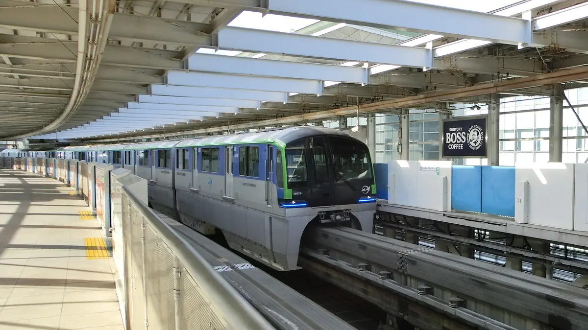 Tokyo Monorail 10000 series train arriving at Haneda Airport Terminal 3 Station