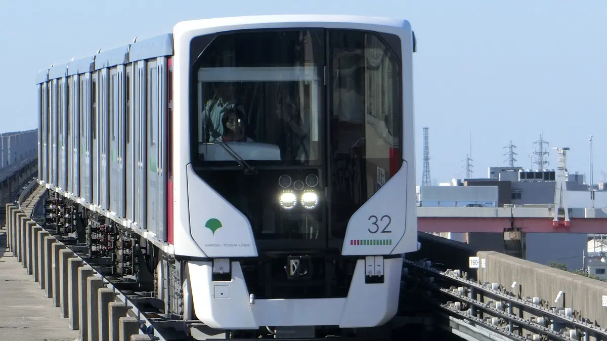 Nippori-Toneri Liner 300 series heading to Adachi-Odai Station