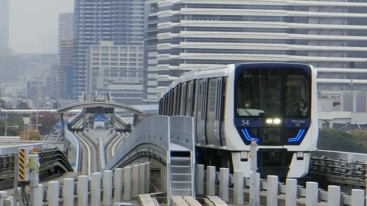 Yurikamome 7500 series train arriving at Ariake Station
